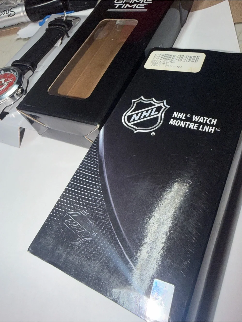 NHL Red Dial Watch with Black Leather Strap
